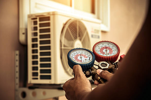 Professional Heat Pump Repair technician working in Fowler, CO